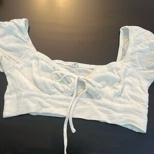 White crop top from garage with tie in the middle